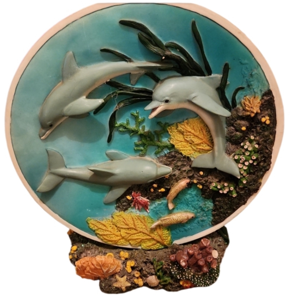90s dolphin 3d plate sits on coral stand